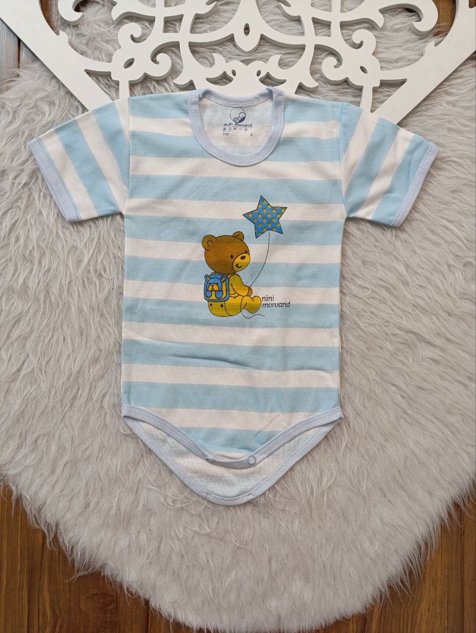 بادی نوزادی زیر دکمه نوزاد